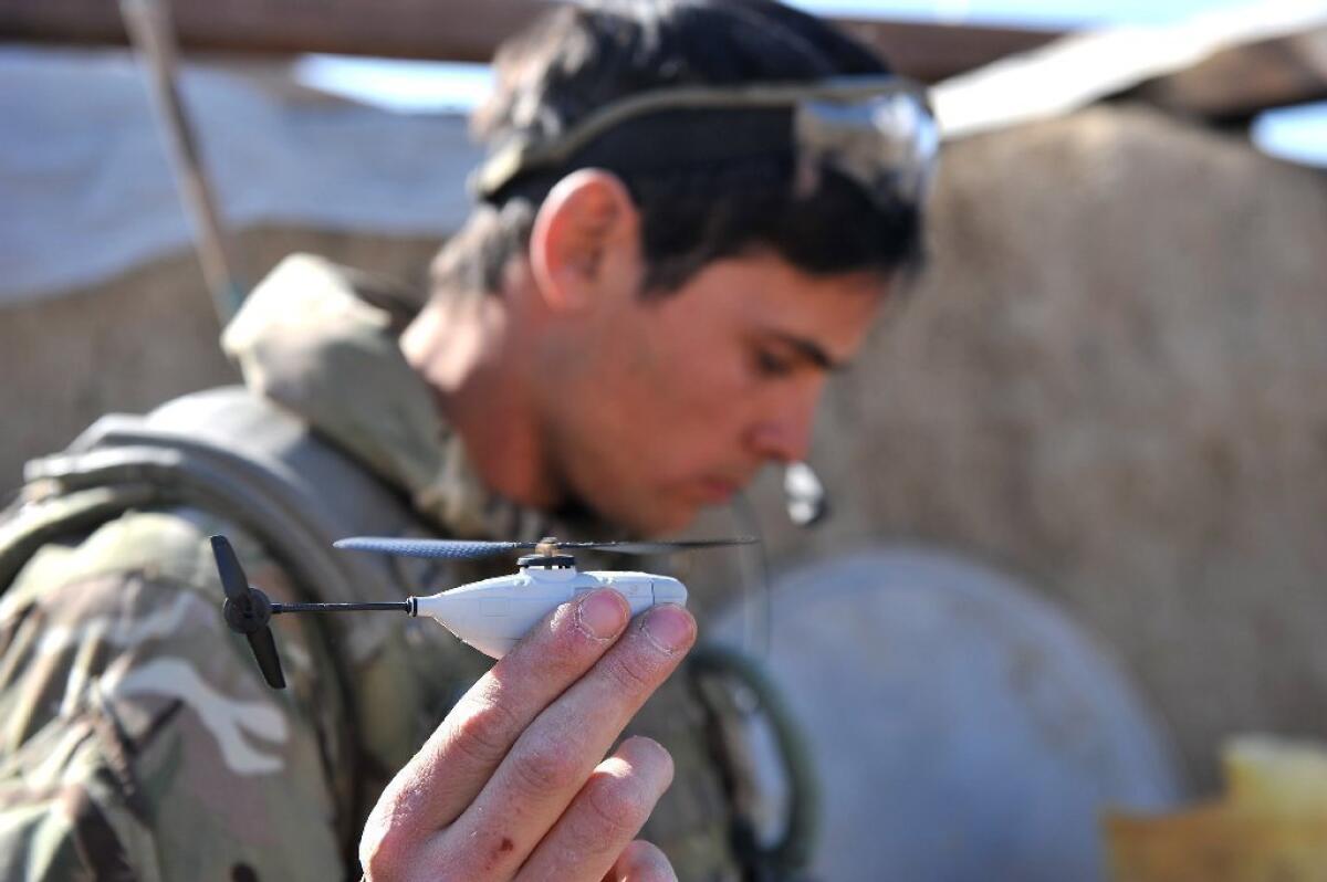 The Norwegian-designed Black Hornet Nano weighs about a half-ounce. The 4-inch-long drone is fitted with a tiny camera that relays still images and video to a remote terminal.