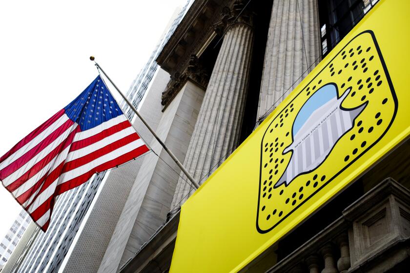 epa06137936 (FILE) - A logo for Snapchat hangs on the front of the New York Stock Exchange in New York, New York, USA, on 17 November 2016. Snap Inc. shares saw a 13 per cent fall at Wall Street on 11 August 2017 following the release of the company's 2nd quarter 2017 results. Acccording to reports, investors were disappointed as Snap was only able to increase the number of its daily users by 7 million instead of expected 10 million. The net loss of Snap also increased to 443 million USD when compared with 116 million USD year-on-year. EPA/JUSTIN LANE ** Usable by LA, CT and MoD ONLY **