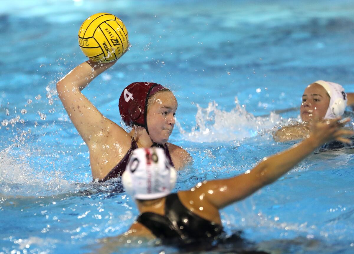 Charlotte Riches (4) of Laguna Beach drives in a goal during Wednesday's CIF Southern Section Open Division semifinal.
