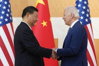 FILE - President Joe Biden, right, and Chinese President Xi Jinping shake hands before their meeting on the sidelines of the G20 summit meeting in Nusa Dua, in Bali, Indonesia on Nov. 14, 2022. The U.S. and Chinese leaders meet Wednesday while attending the annual Asia-Pacific Economic Cooperation summit in San Francisco.(AP Photo/Alex Brandon, File)