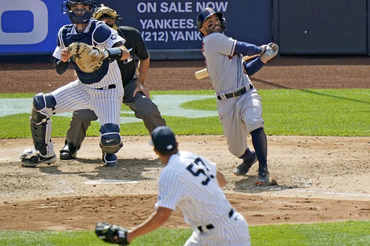 Astros' Jose Altuve hits walk-off HR vs. Yankees, has shirt ripped off