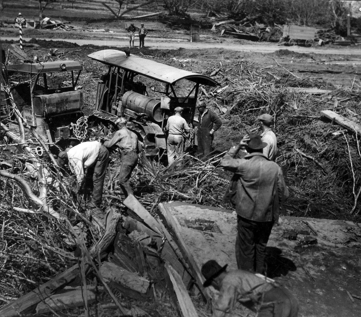 March 25, 1928: Clearing away debris near Santa Paula following the St. Francis Dam disaster.