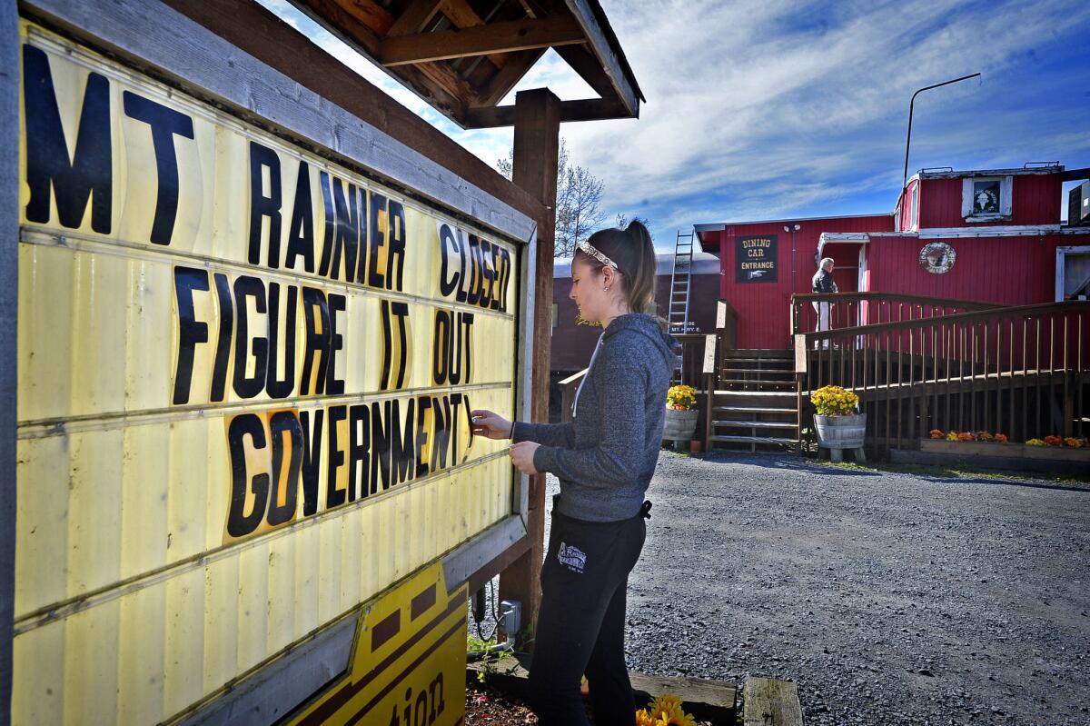 A sign outside the Mt. Rainier Railroad Dining Co. in Elbe, Wash., last month chastised Washington for the closure of Mt. Rainier National Park due to the partial government shutdown.