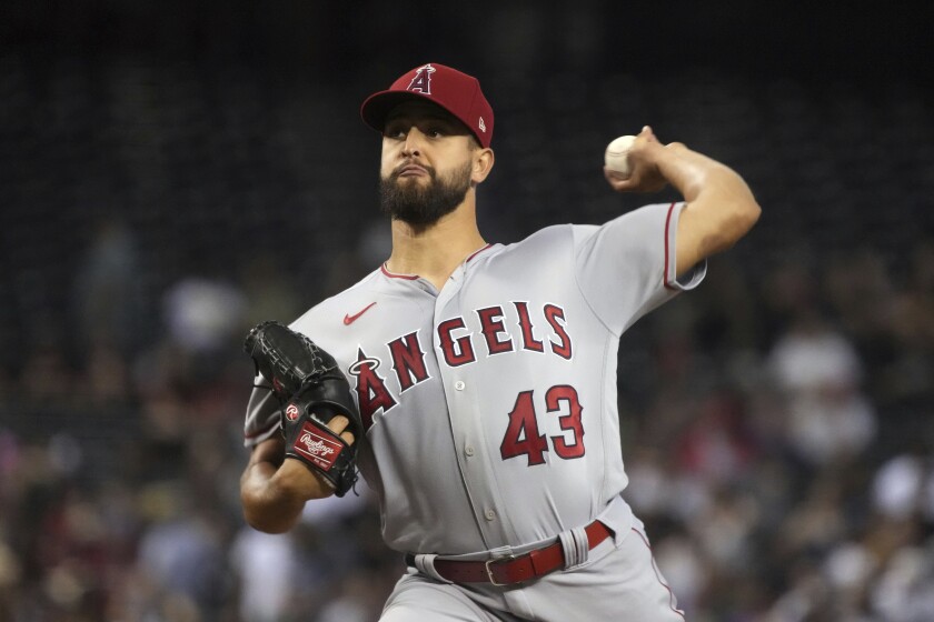 Los Angeles Angels pitcher Patrick Sandoval throws against the Arizona Diamondbacks in the first inning during a baseball game, Sunday, June 13, 2021, in Phoenix. (AP Photo/Rick Scuteri)
