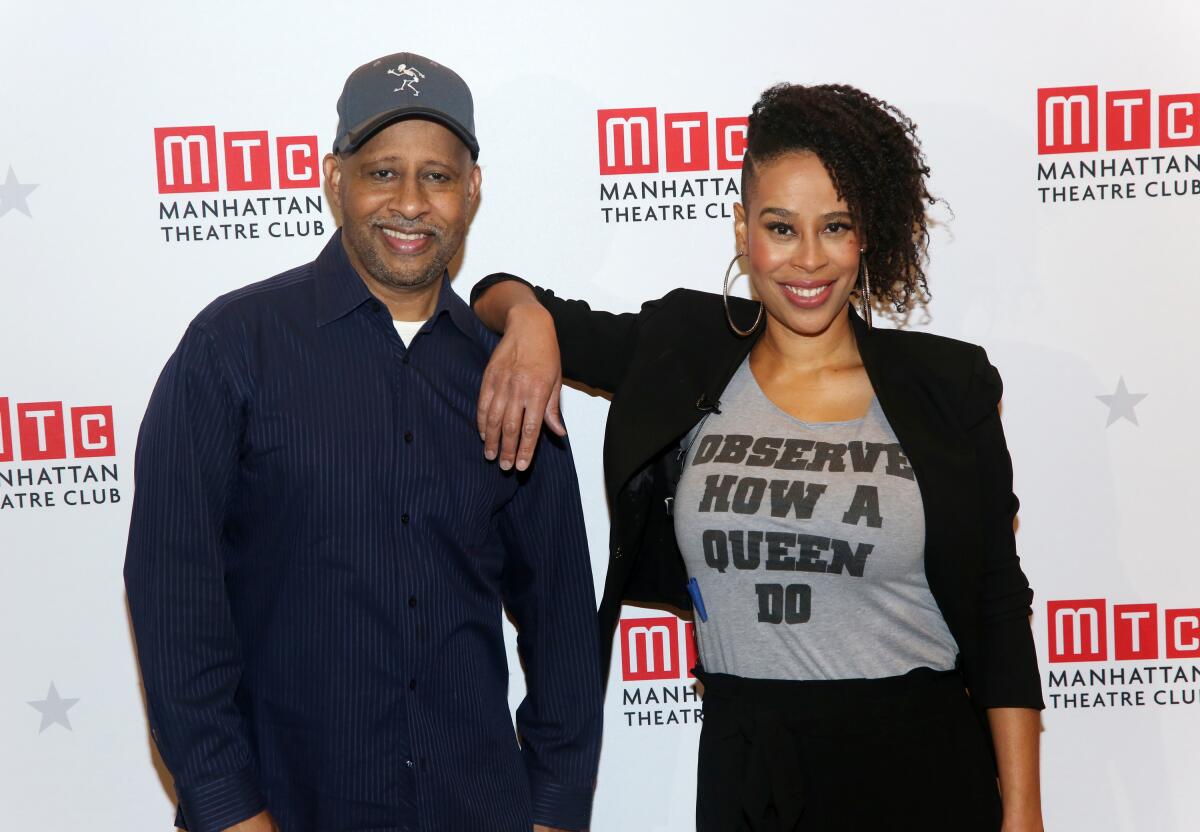 Ruben Santiago-Hudson and Dominique Morisseau standing together and smiling