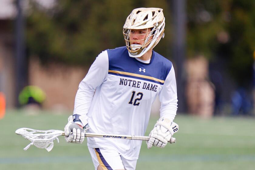 Tyler Buchner #12 of Notre Dame before a game between Syracuse and Notre Dame at Arlotta Stadium.