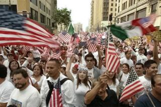 Immigrants and supporters gather at a march in 2006.
