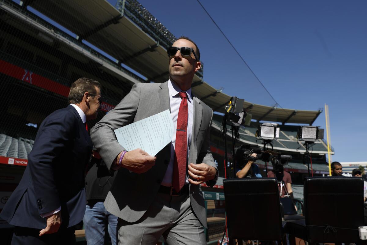 Angels General Manager Billy Eppler makes his way from the clubhouse as the Angels introduce Joe Maddon as latest manager at a press conference held at Angel Stadium in Anaheim on Oct. 24.