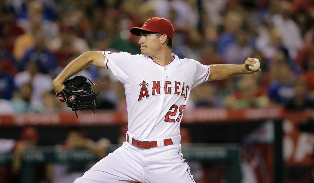 Los Angeles Angels starting pitcher Andrew Heaney throws against the Los Angeles Dodgers during the third inning on Tuesday.