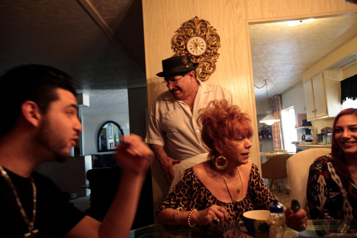 Frankie Citro has lunch at his home with his family, including his son, Frankie Jr., left, wife Cookie and daughter Bettina. [For the record: A previous version of this photo caption misspelled Bettina Citro's name as Betina.]