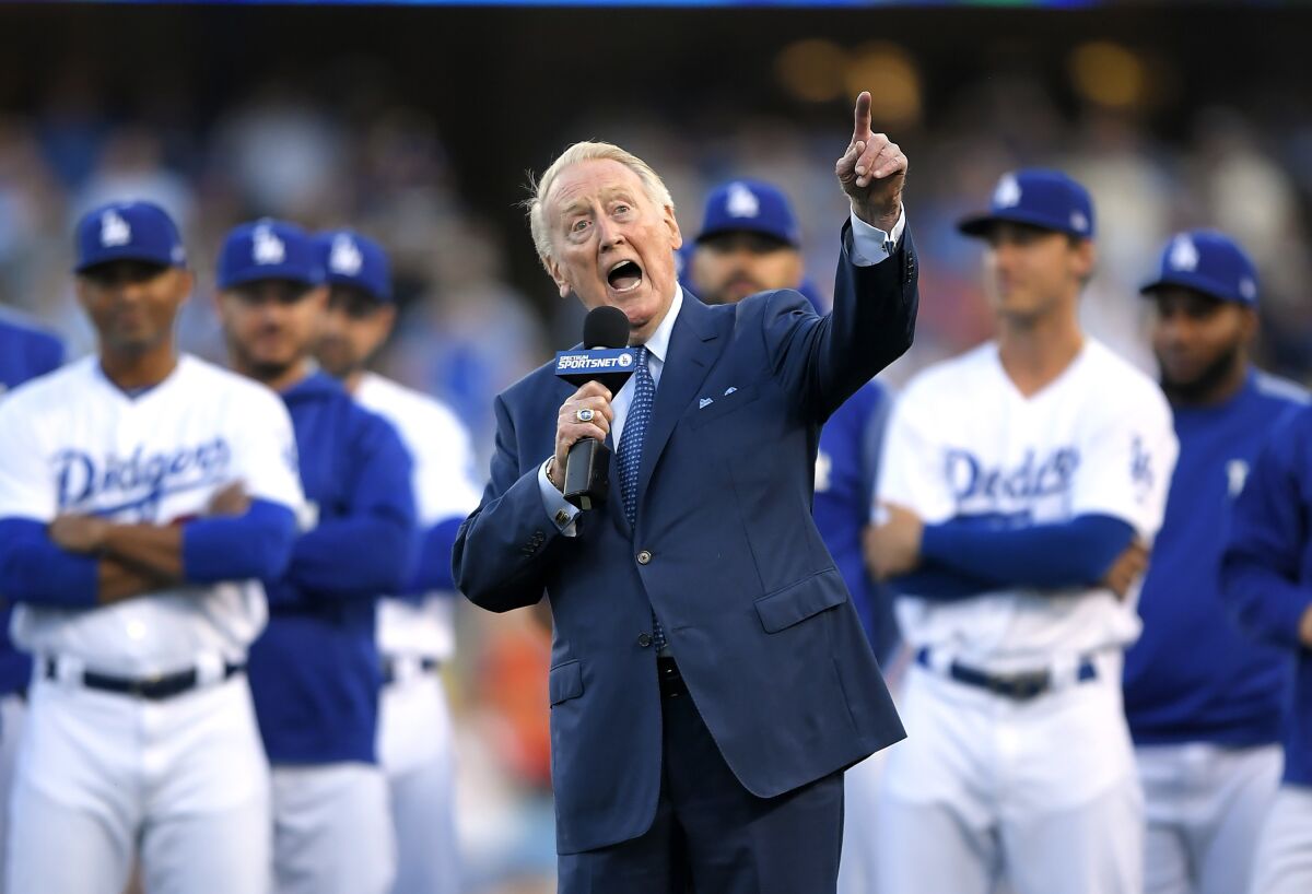 Dodgers broadcaster Vin Scully speaks as he's inducted into the Dodgers' Ring of Honor.