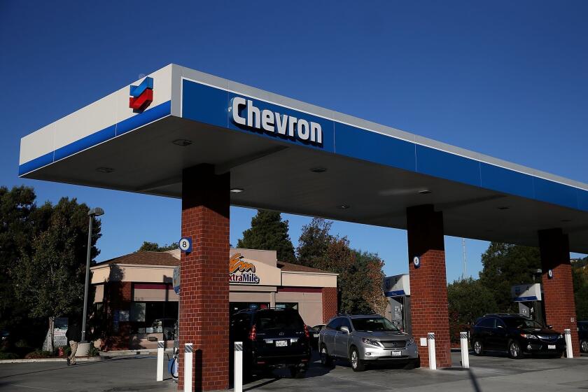 A Chevron station in Greenbrae, Calif. The company contributed $1.8 million to oil industry lobbying efforts to block climate change legislation.