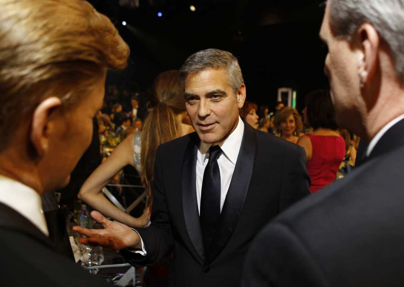 "The Descendants" actor George Clooney chats with onlookers during the show.