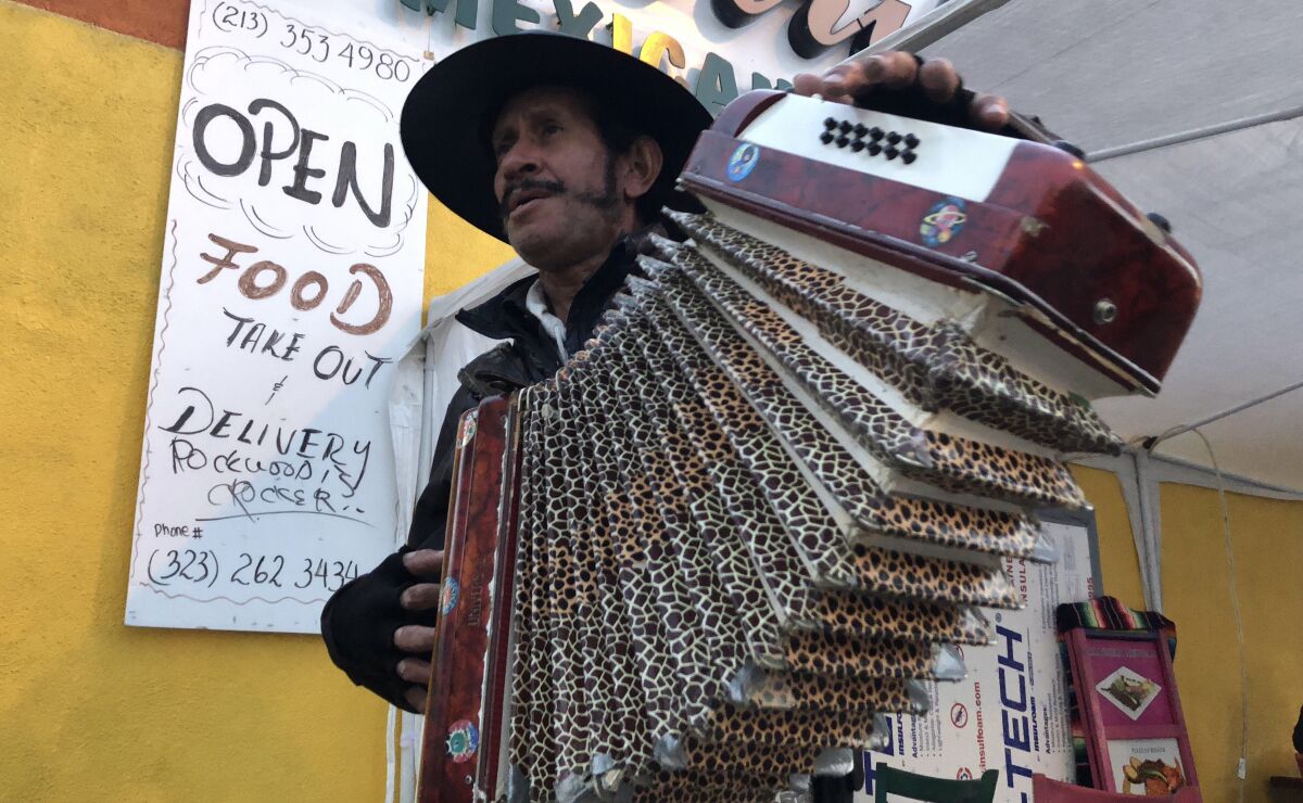 César Villanueva, originally from Guatemala, plays accordion in the duet.