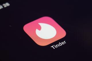 FILE - The icon for the Tinder dating app appears on a device in New York on July 28, 2020. Whether looking for love or a casual encounter, 3 in 10 U.S. adults say they have used a dating site or app. That's according to a new Pew Research Center study out Thursday. (AP Photo/Patrick Sison, File)