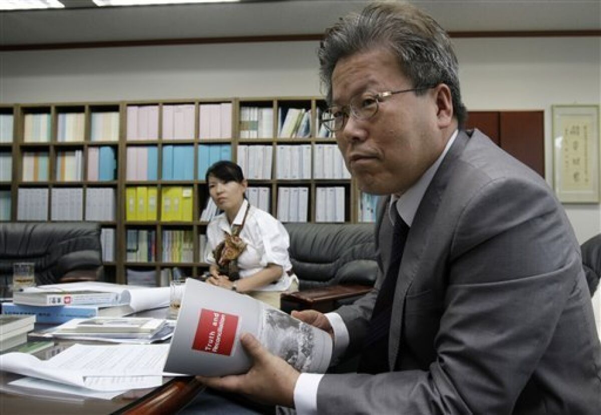 In this June 10, 2010 photo, Lee Young-ho, president of The Truth and Reconciliation Commission, talks during an interview with The Associates Press in Seoul, South Korea. In a political about-face, a South Korean commission investigating the U.S. military's large-scale killing of refugees and other civilians in the Korean War has ruled the Americans in case after case acted out of military necessity. Shutting down the inquiry into South Korea's hidden history, the commission also will leave untouched scores of mass graves believed to hold remains of tens of thousands of South Korean political detainees summarily executed by their government early in the 1950-53 war, sometimes as U.S. officers watched. (AP Photo/Ahn Young-joon)
