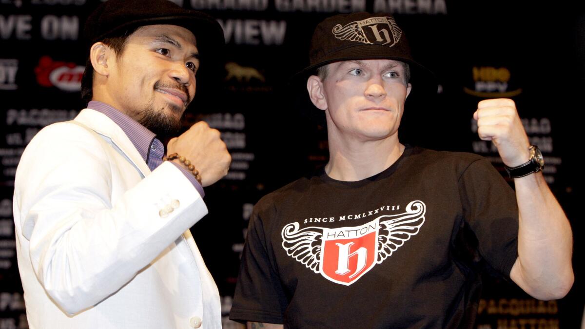 Ricky Hatton, right, poses for a photo with Manny Pacquiao during a news conference before their fight in 2009.