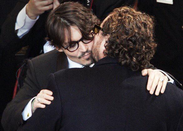 Johnny Depp greets Julian Schnabel