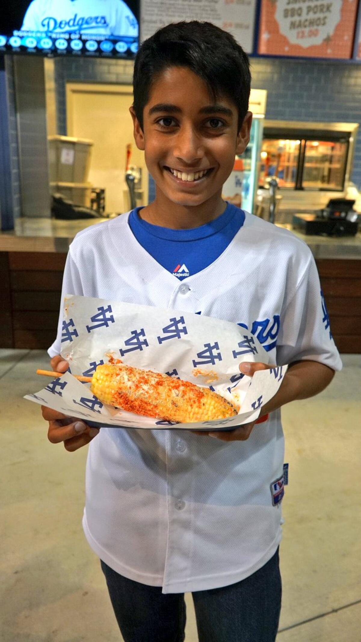 Nick Lakhani and his Cheeto-covered corn.