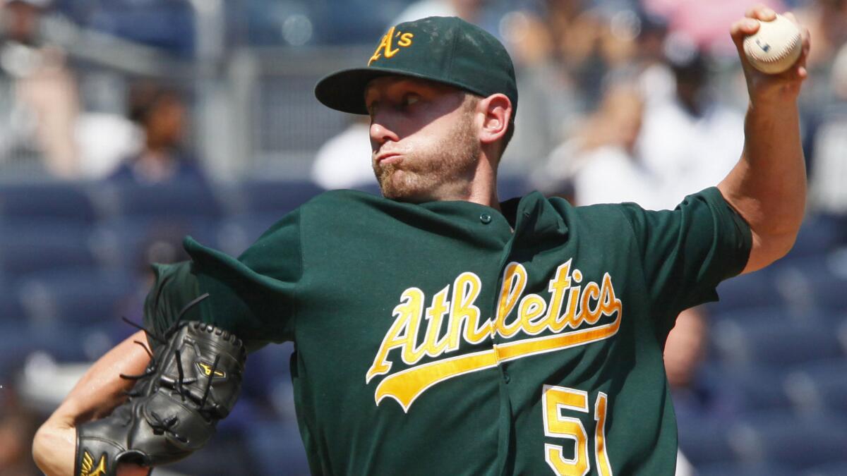 Oakland Athletics pitcher Dallas Braden delivers a pitch during a game against the New York Yankees in 2010. The former Oakland starter's short career included a perfect game on Mother's Day 2010.