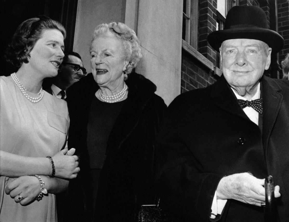 Mary Soames, left, the youngest daughter of Clementine and Winston Churchill, all seen here in 1963, has died at 91.