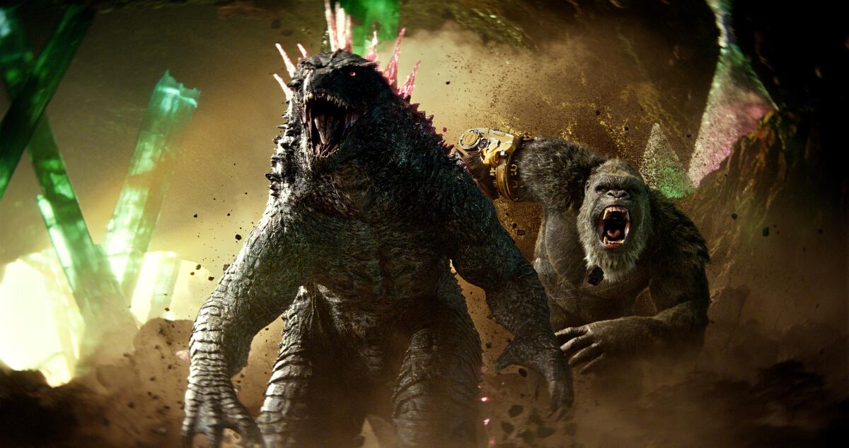 The title characters of "Godzilla x Kong: The New Empire" roar.