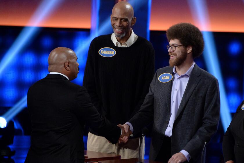 CELEBRITY FAMILY FEUD - "Harvey Family Men vs Harvey Family Women and Kareem Abdul-Jabbar vs Ralph Sampson"- The celebrity teams competing to win cash for their charities features Steve Harvey's wife, Marjorie Harvey, leading a team with their sons and sons-in-law, and the other team will be led by Mrs. Harvey's mother and the Harvey daughters. In a separate game, family members from the NBA's all-time leading scorer and six-time NBA champion Kareem Abdul-Jabbar will take on retired NBA Legend Ralph Sampson and his family. This episode of "Celebrity Family Feud" airs SUNDAY, JUNE 25 (8:00-9:00 p.m. EDT), on The Walt Disney Television via Getty Images Television Network.. (Eric McCandless/Walt Disney Television via Getty Images) STEVE HARVEY, KAREEM ABDUL-JABBAR, ADAM ABDUL-JABBAR, ROSE-ANN SWANN