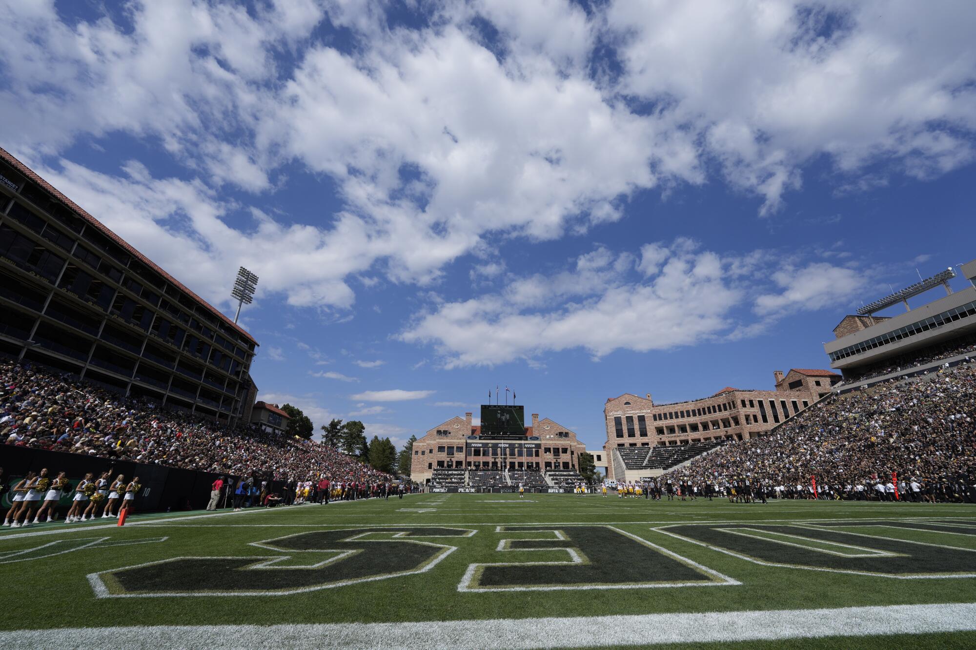 Clouds roll over Folsom Field in the second half between USC and Colorado.