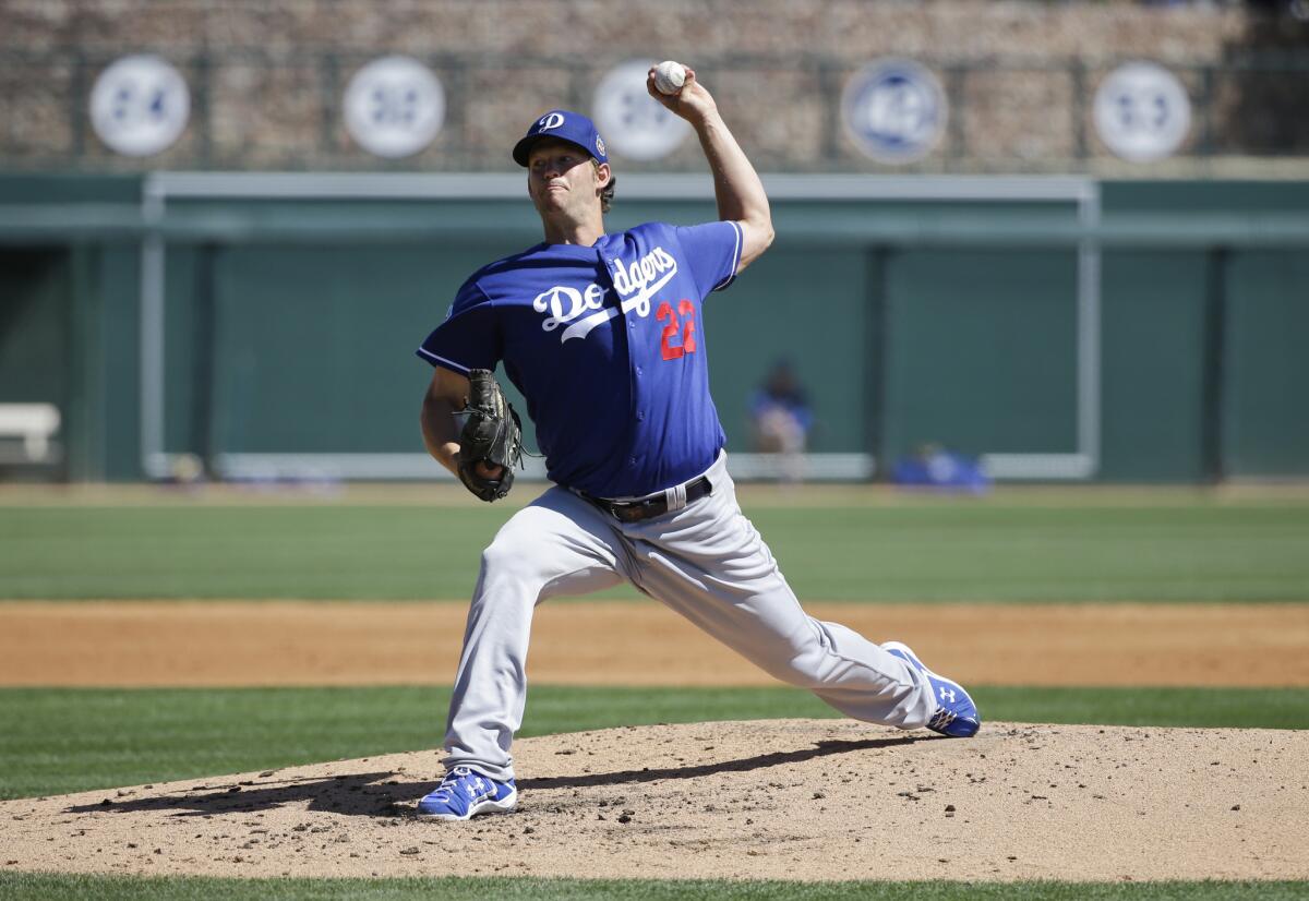 Dodgers starting pitcher Clayton Kershaw throws a pitch against the White Sox during a spring training game.