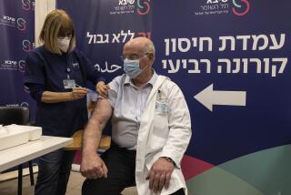 Professor Jacov Lavee receives a fourth dose of Pfizer-BioNTech COVID-19 vaccine in Ramat Gan, Israel.