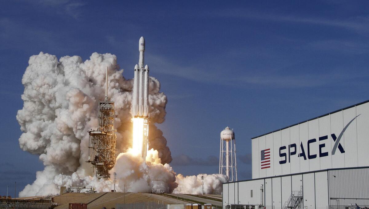 A SpaceX Falcon Heavy rocket lifts off in Cape Canaveral, Fla., in February 2018.