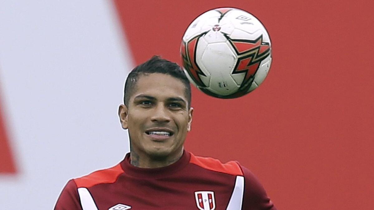 Peru's Paolo Guerrero, in 2017 photograph, says he did not knowingly drink a tea prepared with coca, a banned substance in soccer.