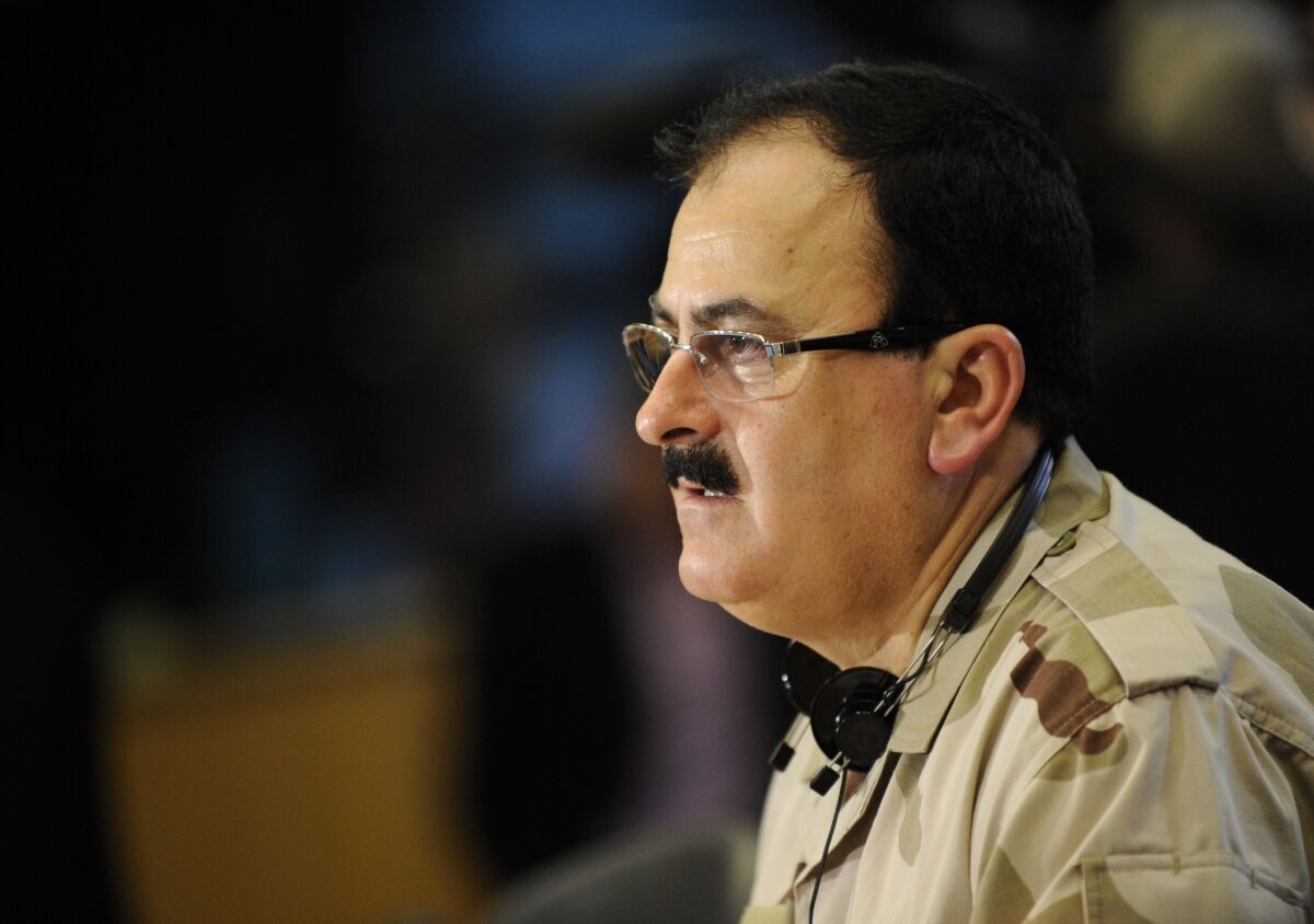 This file photo taken on March 6, 2013, shows the chief commander of the rebel Free Syrian Army, Brig. Gen. Salim Idriss, speaking during a news conference at the European Union Parliament in Brussels.