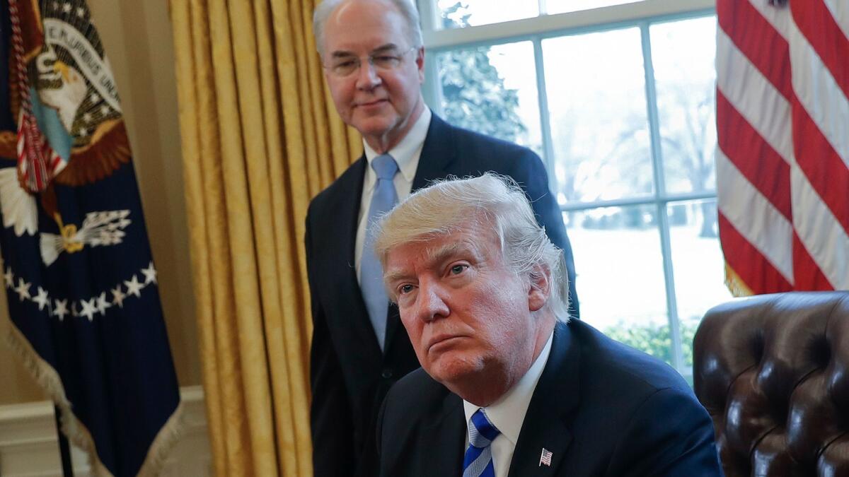 President Donald Trump with Health and Human Services Secretary Tom Price in the Oval Office of the White House on March 24.