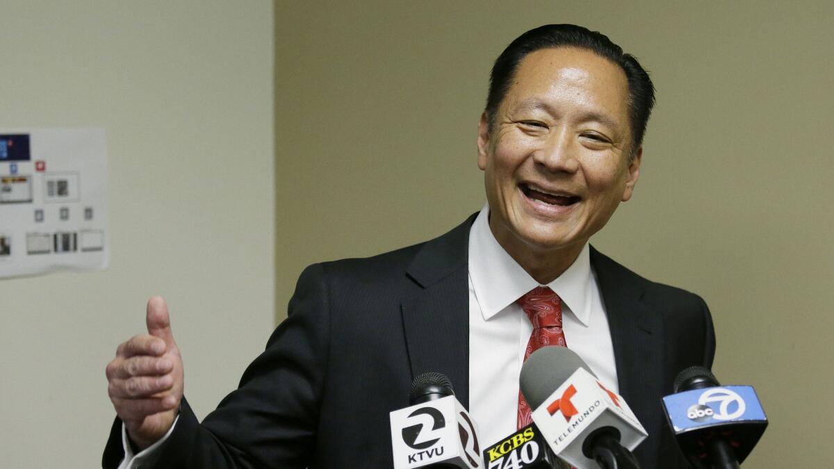 Then-San Francisco Public Defender Jeff Adachi gestures during a news conference in San Francisco on April 26, 2016. A freelance journalist's home and office were raided in connection with what police called the illegal release of a report on Adachi's death.