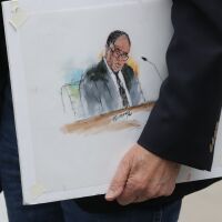 A courtroom artist holds a rendering of suspended Los Angeles City Council member Mark Ridley-Thomas. 