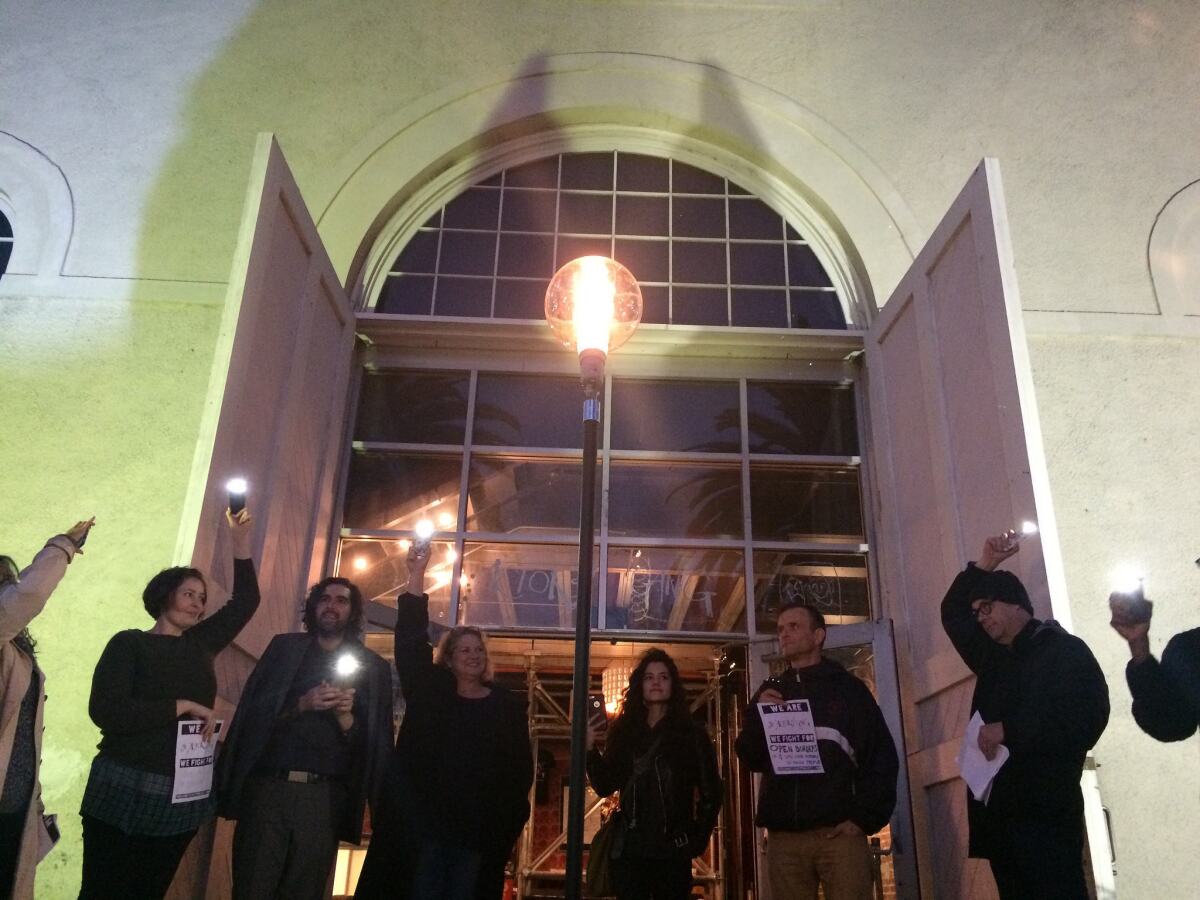 Members of the Actors' Gang in Culver City turn on a "ghostlight" as a gesture of welcome.