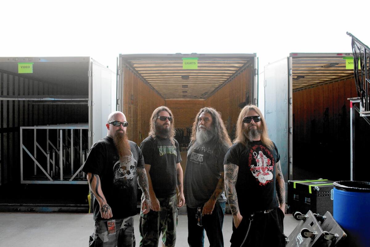 Slayer band members, from left, Kerry King, Paul Bostaph, Tom Araya and Gary Holt before their show at the San Manuel Amphitheater in San Bernadino on June 27, 2015.