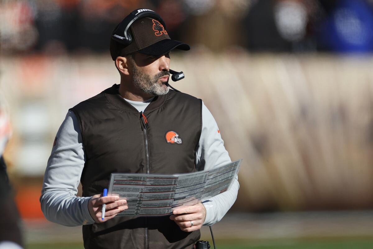 Cleveland Browns head coach Kevin Stefanski watches the first half of an NFL football game against the Baltimore Ravens.