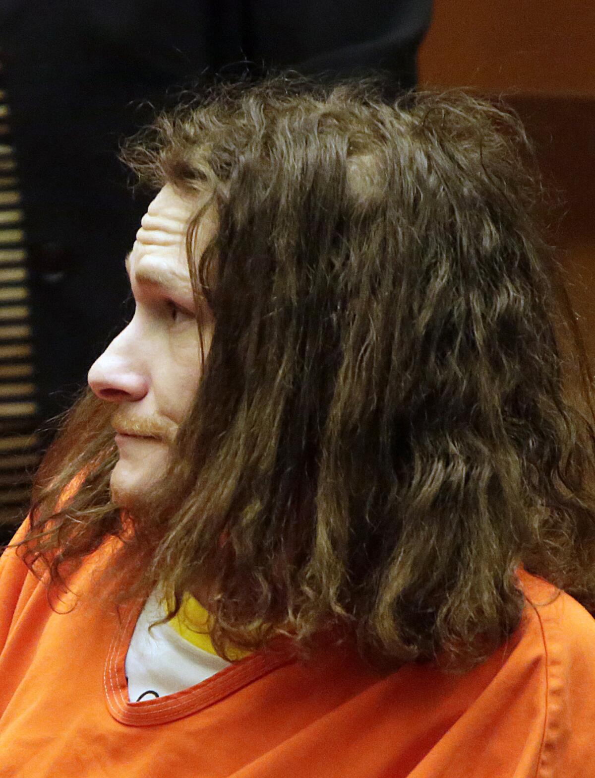 Jason Joel Wolstone, shown in court in October 2013, pleaded guilty to assault likely to produce great bodily harm in connection with the fatal stabbing of a Lynwood woman off Hollywood Boulevard and Highland Avenue four months earlier.
