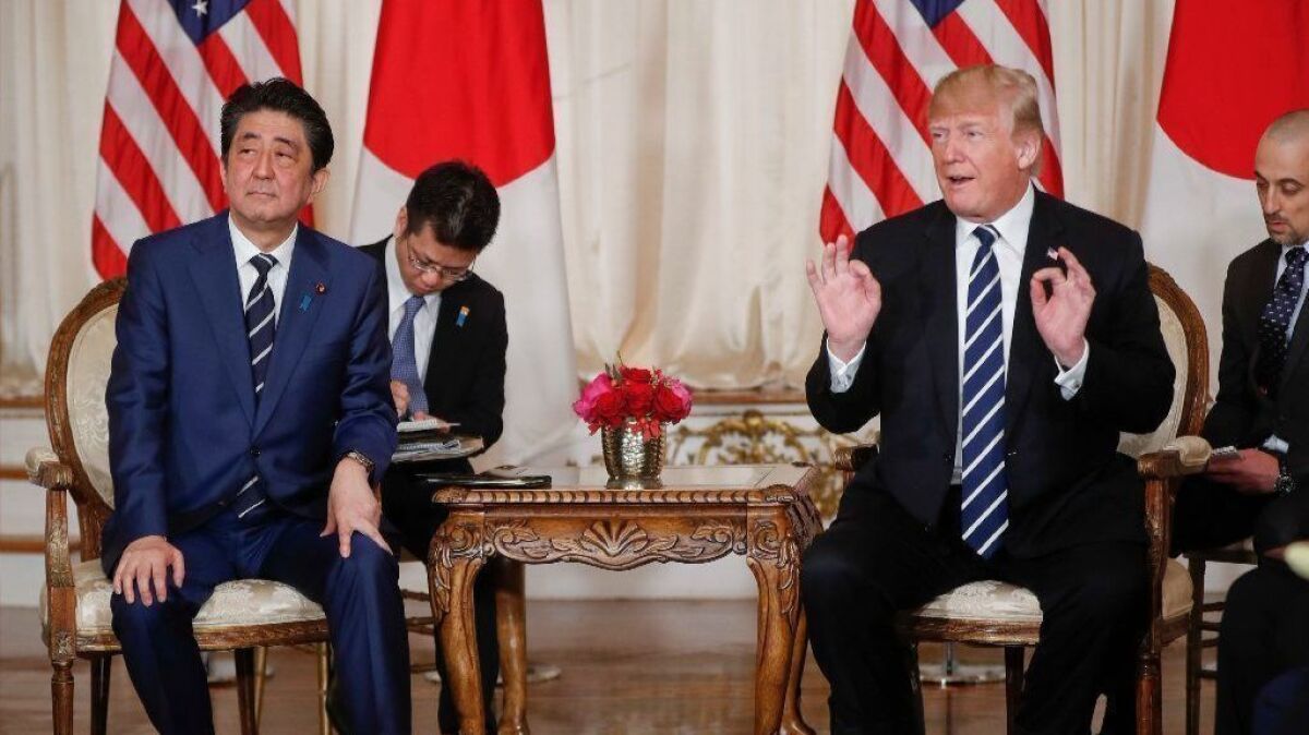 President Trump and Japanese Prime Minister Shinzo Abe meet Tuesday at Trump's Mar-a-Lago estate in Palm Beach, Fla.