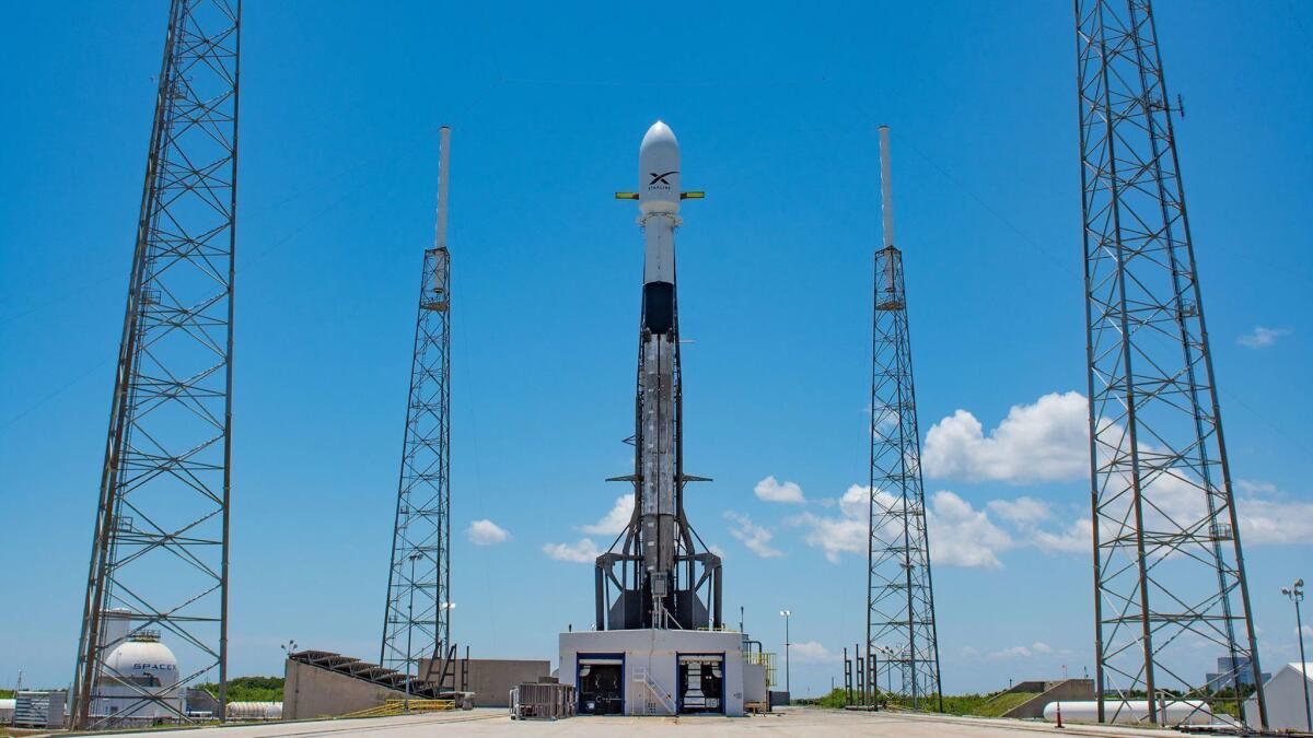A SpaceX rocket is loaded with satellites on May 16 ahead of a launch at Cape Canaveral in Florida.