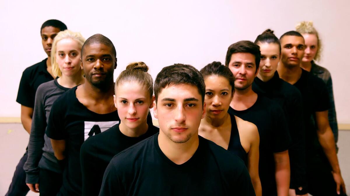 The dancers of Jacob Jonas the Company pause during a rehearsal for their show at the Wallis.