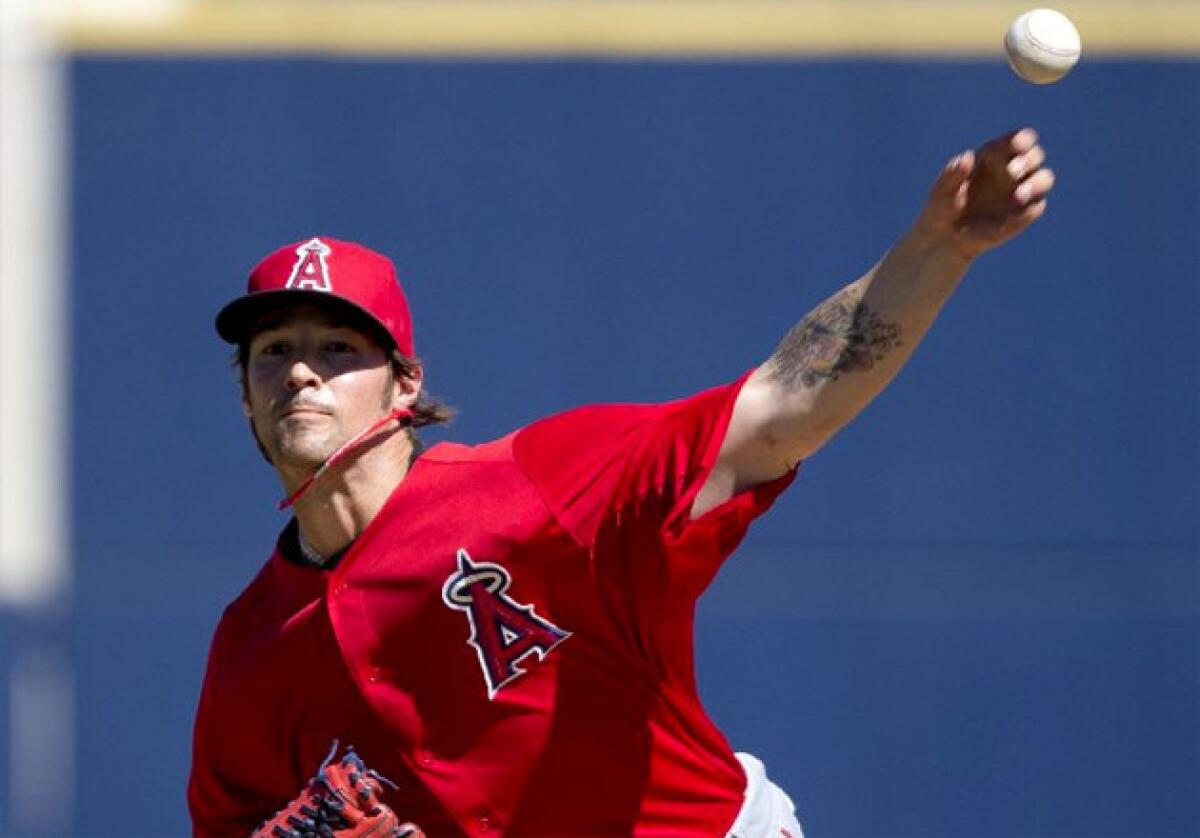 C.J. Wilson gave up two runs and four hits in 1 2/3 innings Saturday.