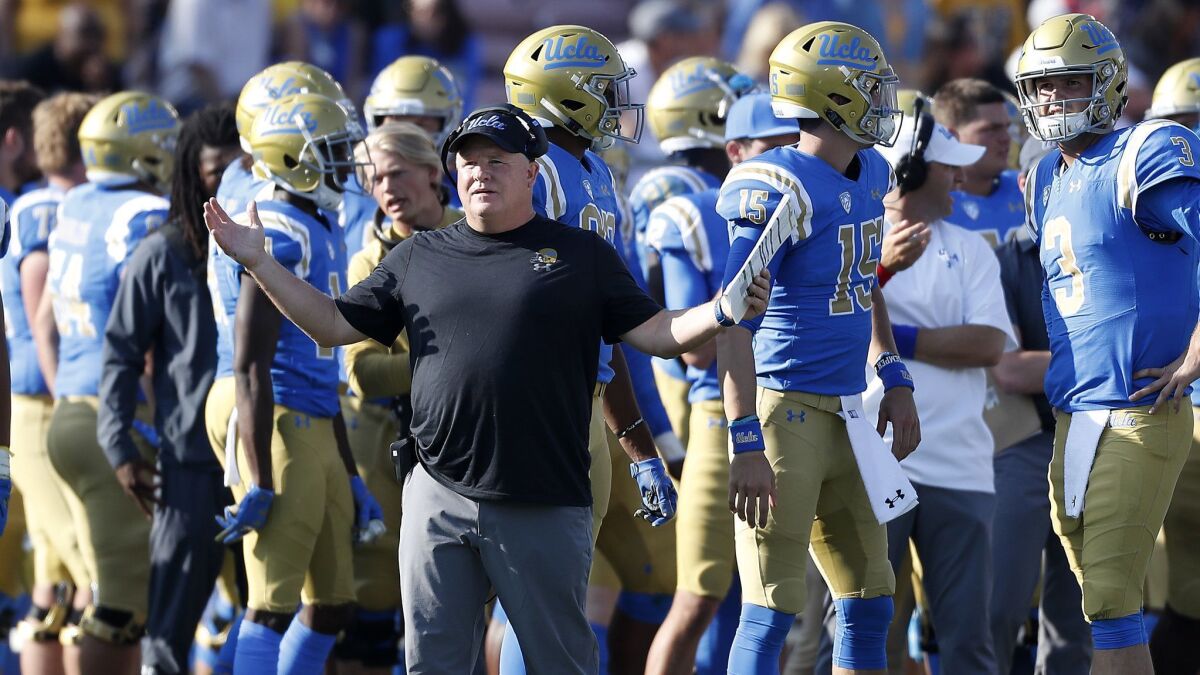 UCLA head coach Chip Kelly watches his team play Stanford in the third quarter Nov. 24, 2018, at the Rose Bowl.