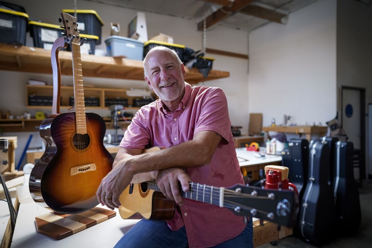 Shawn Weimar inside his Oceanside luthier studio at Zoe Guitars.