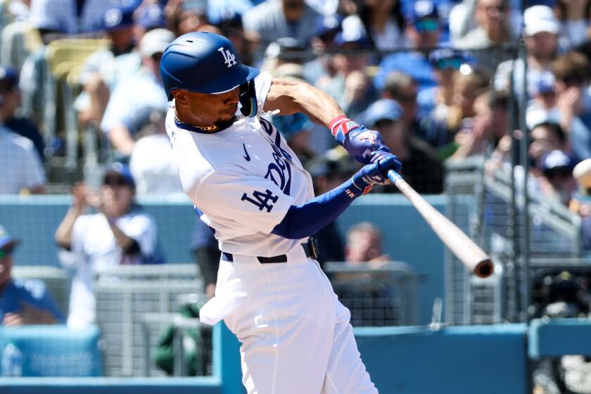 LOS ANGELES, CA - MARCH 28: Los Angeles Dodgers' Mookie Betts hits a home-run.