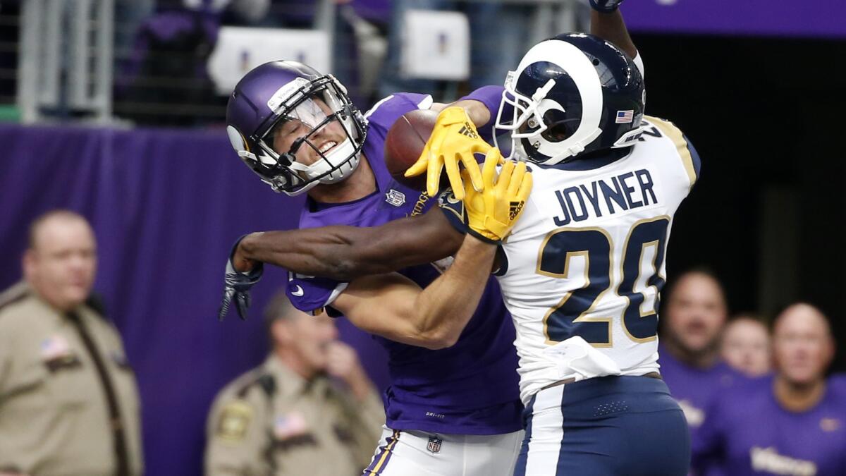 Rams safety Lamarcus Joyner breaks up a pass intended for Vikings wide receiver Adam Thielen during the first half last week.