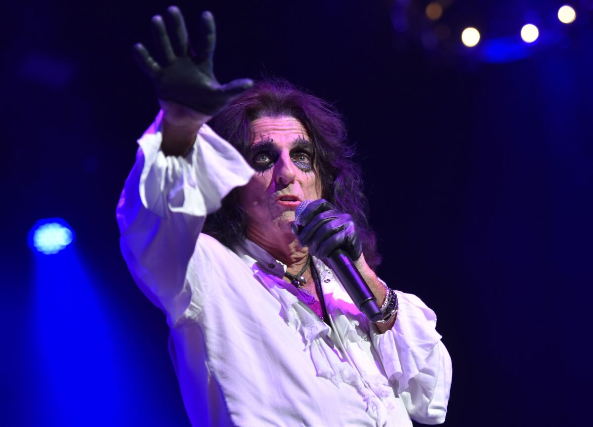 FILE - Alice Cooper performs in Chicago on July 21, 2019. The rock icon spent his down time during the COVID-19 pandemic with his family in Phoenix, developing an unlikely new skill — tap dancing. (Photo by Rob Grabowski/Invision/AP, File)