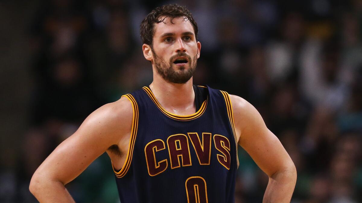 Cleveland Cavaliers forward Kevin Love looks on during a playoff game against the Boston Celtics on April 23.